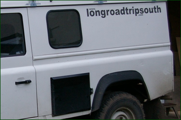 Side window, side graphics and jerry can locker