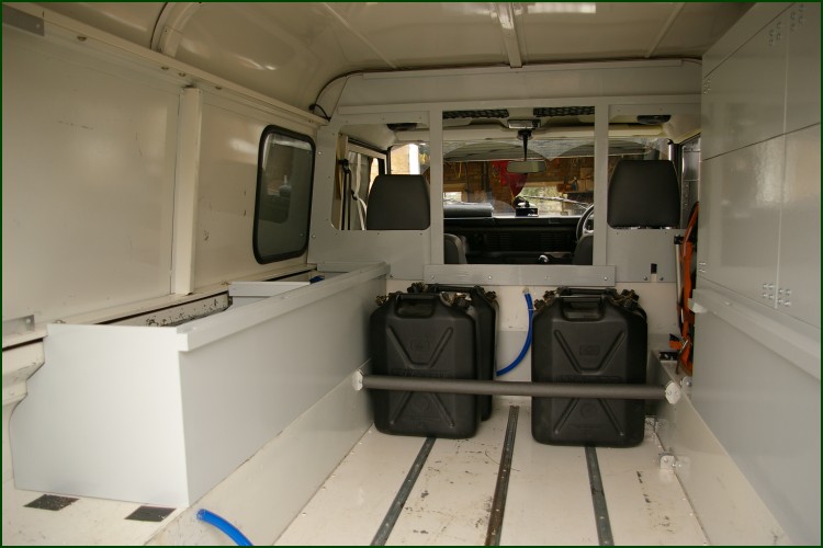 Water cans, stowage boxes and scerity screen