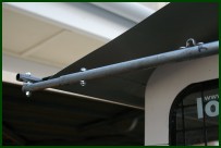 The rear awning pole adjustment